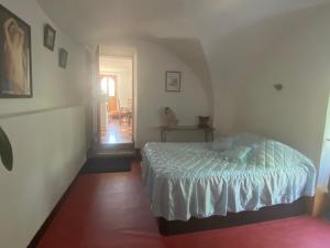 Postel nebo postele na pokoji v ubytování Le gite du moulin