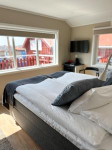 Postel nebo postele na pokoji v ubytování Hotell Käringön