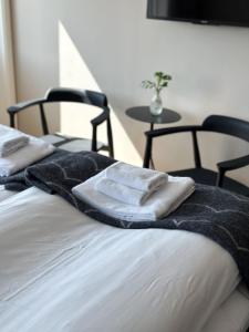 Postel nebo postele na pokoji v ubytování Hotell Käringön