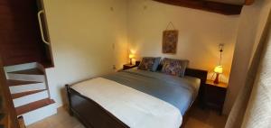 Postel nebo postele na pokoji v ubytování Quinta Flores