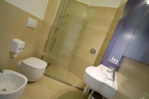Ванная комната в Hotel Emilia
