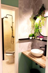 Koupelna v ubytování JARAUTARESORT + 40 fotografií