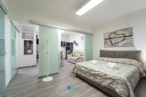 Cama o camas de una habitación en City Center white