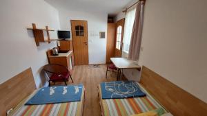 a room with two mats on the floor of a room at Willa Kryształ in Stegna