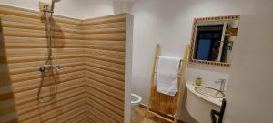 a bathroom with a shower and a sink at CASA ZOUINA in Agadir