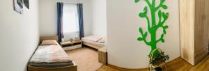 Postelja oz. postelje v sobi nastanitve zentrale,vollausgestattete Ferienwohnung - 3 Zimmer, Petrovic