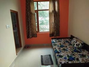 Postel nebo postele na pokoji v ubytování Kanta Riverside Home Stay