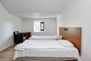 Postel nebo postele na pokoji v ubytování Hotell Hof