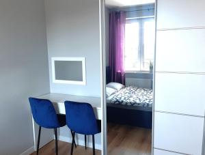 Ένα ή περισσότερα κρεβάτια σε δωμάτιο στο Apartament Wawa
