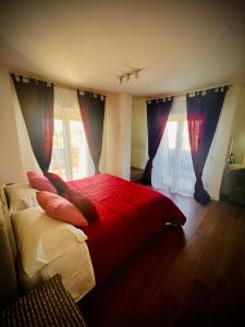 מיטה או מיטות בחדר ב-Attico Suite Superior Sul Mare