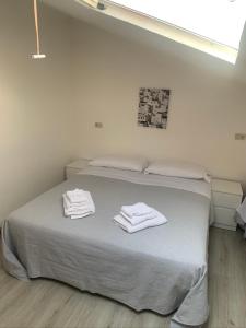 Postel nebo postele na pokoji v ubytování Hotel Lucerna