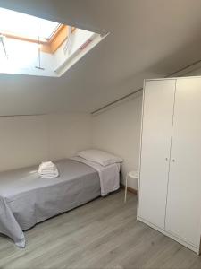 Postel nebo postele na pokoji v ubytování Hotel Lucerna