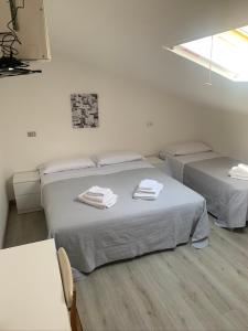 Postel nebo postele na pokoji v ubytování Hotel Lucerna