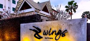 Ein Zertifikat, Auszeichnung, Logo oder anderes Dokument, das in der Unterkunft Wings by Croske Resort Langkawi ausgestellt ist