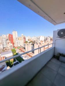 a balcony with a view of a city at Semipiso Zona Plaza Paso Opcional Cohera by Lofter in La Plata