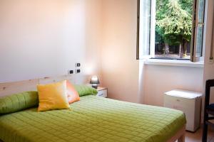 Postel nebo postele na pokoji v ubytování CiaoMi - Hostel & Long Stay - Milano Niguarda & Bicocca