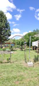 a swing set in the middle of a field at Les gorges du Verdon in Riez
