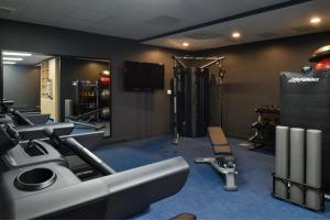 a gym with cardio equipment in a room at TownePlace Suites by Marriott Asheville Downtown in Asheville