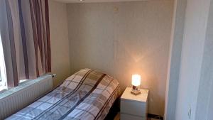 Postel nebo postele na pokoji v ubytování Arconaty Hotel
