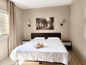 מיטה או מיטות בחדר ב-Ocean View Villas Canarias