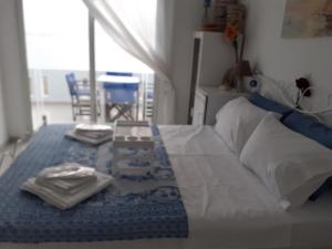 A bed or beds in a room at Seafront Aegean Νest