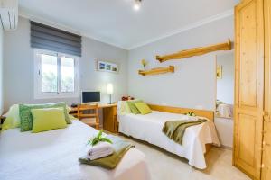 Posteľ alebo postele v izbe v ubytovaní Ideal Property Mallorca - Finca Alegre