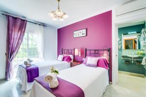 Posteľ alebo postele v izbe v ubytovaní Ideal Property Mallorca - Finca Alegre