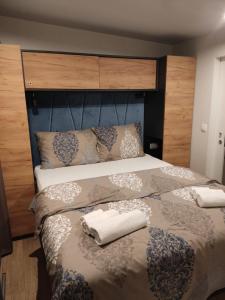 Postel nebo postele na pokoji v ubytování Mobile home LA ISLA BONITA, Terra Park SpiritoS