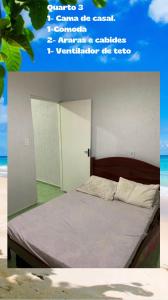 a poster of a bedroom with a bed at Casa de praia completa in Mongaguá