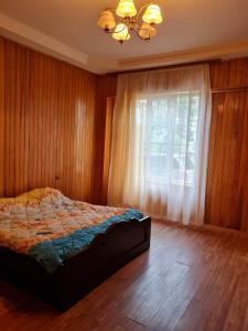 Кровать или кровати в номере apartment kobuleti