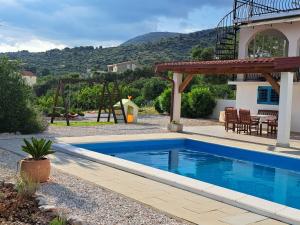 Bazén v ubytovaní Holiday home Trogir flower alebo v jeho blízkosti