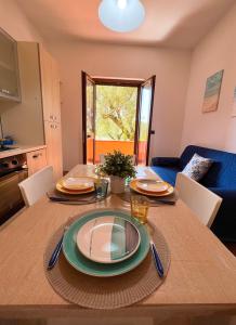 A seating area at NaturAmare Apartments Palinuro
