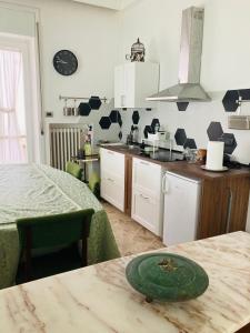 Køkken eller tekøkken på Viva la Nonna + 18 billeder