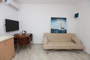 TV a/nebo společenská místnost v ubytování Vergia Apartment 1
