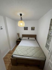 Ένα ή περισσότερα κρεβάτια σε δωμάτιο στο Sailboat Apartment