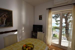 TV a/nebo společenská místnost v ubytování Apartment Vlasta