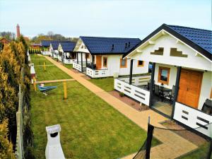 an aerial view of a row of houses at Baltic-Star in Gąski