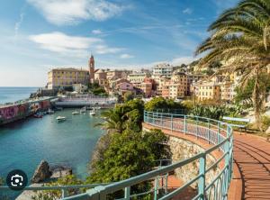 a view of a city from a bridge over a body of water at Casa Vacanza Ginevra in Genoa