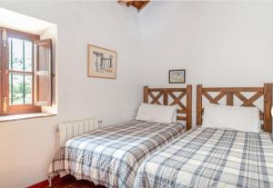 Tempat tidur dalam kamar di Molino del Caracol