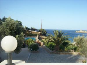 a house with a view of the ocean at Vassiliki Studios in Andros