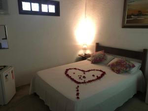 Postel nebo postele na pokoji v ubytování Pousada Estalagem Paraty