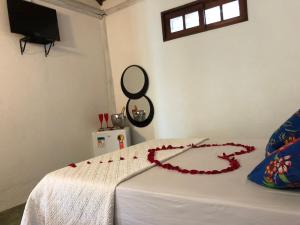 Postel nebo postele na pokoji v ubytování Pousada Estalagem Paraty