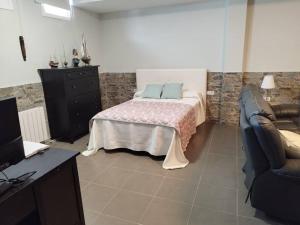 Łóżko lub łóżka w pokoju w obiekcie Villa de lujo frente al mar