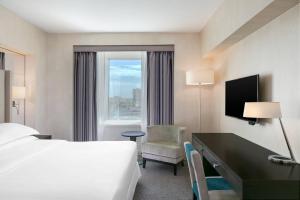 Postel nebo postele na pokoji v ubytování Sheraton Bucharest Hotel