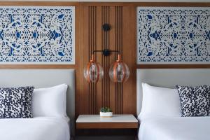 Postel nebo postele na pokoji v ubytování Austin Marriott South