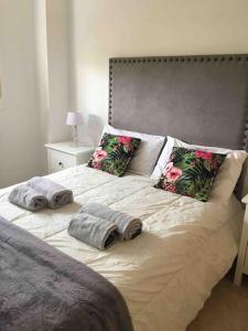 Łóżko lub łóżka w pokoju w obiekcie Superbe appartement avec piscine à 800m de la mer
