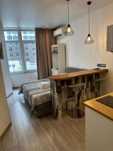Кухня або міні-кухня у Arcadia apartment & sea terrace