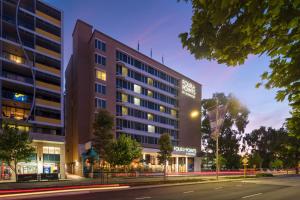 a rendering of a hotel at night at Four Points by Sheraton Perth in Perth