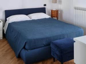 Postel nebo postele na pokoji v ubytování Casa a Vecchiano nei pressi Pisa, Lucca e Versilia