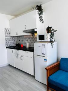Kuchnia lub aneks kuchenny w obiekcie Apartamento perla marina